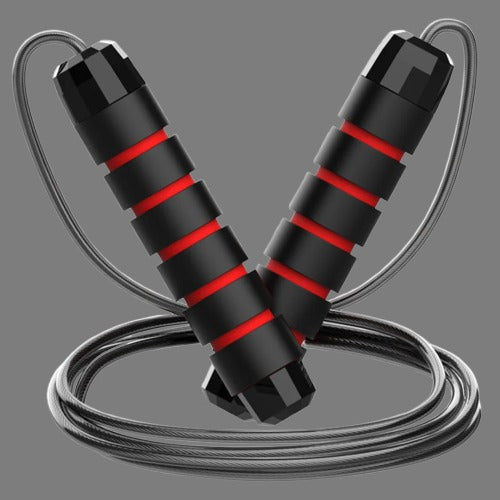 Black and red jump rope on a gray background