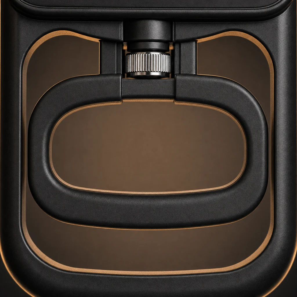 Close-up of the X-Grip PowerTester squeeze mechanism — the closed inner loop on a knurled chrome pivot inside the oval frame