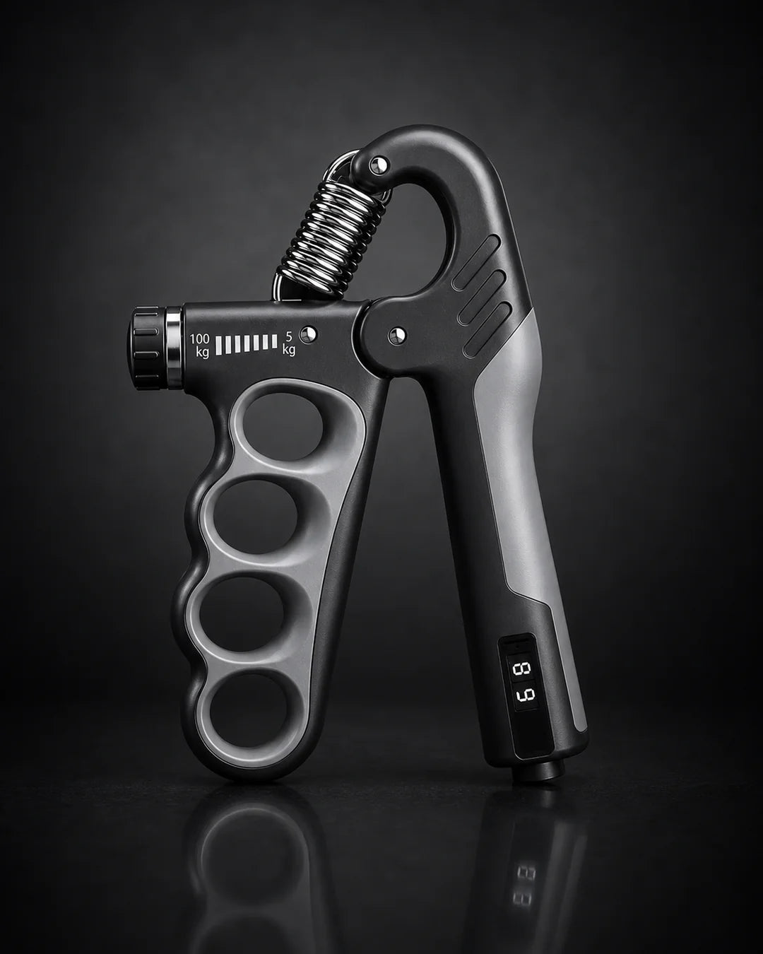 X-Grip Pro adjustable hand strengthener in gray, 5 to 100 kg dial-adjustable resistance, dark studio hero shot