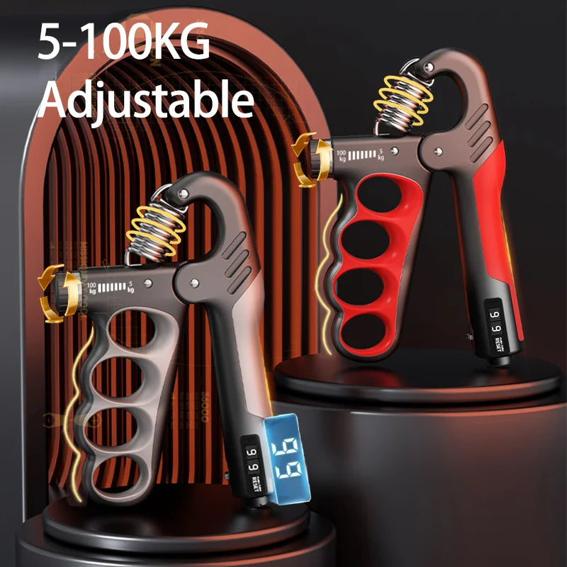 X-Grip Pro gray and red adjustable hand grippers 5-100kg on display stands with LCD digital counters